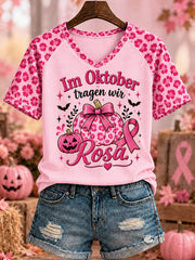 Women's “Im Oktober   tragen wir   ROSA.” Printed V-neck T-shirt